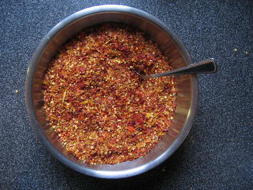 Bowl of crushed Assam peppers