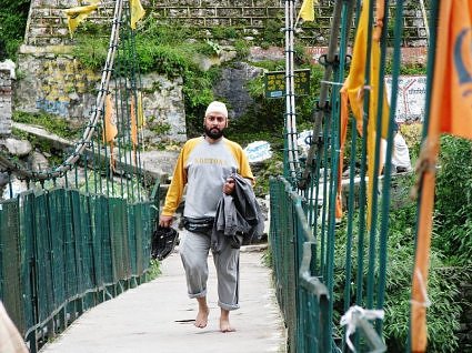 Pilgrim returning from Hemkund, crosses the bridge at Govindghat