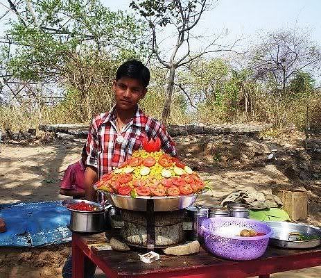 Vendor selling matar alu chaat on the second trek route to Chandi Devi